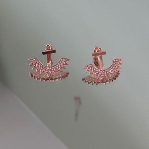 Rose gold bar earrings with a rose gold cuff jacket